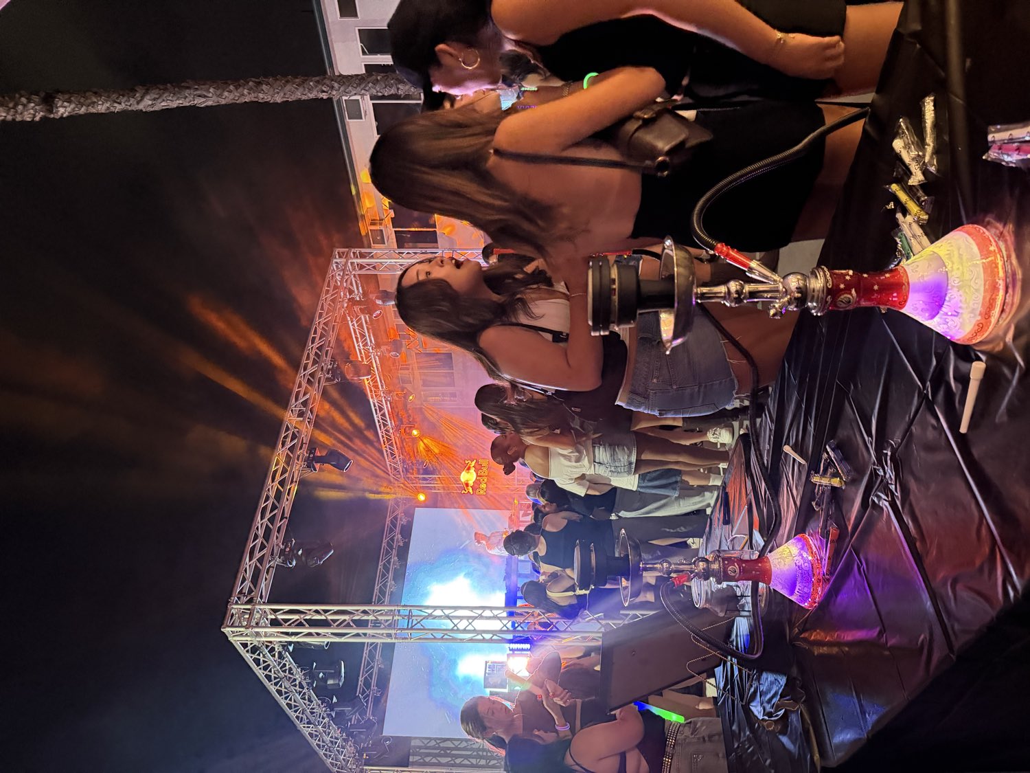 Guests enjoying hookah at a live event